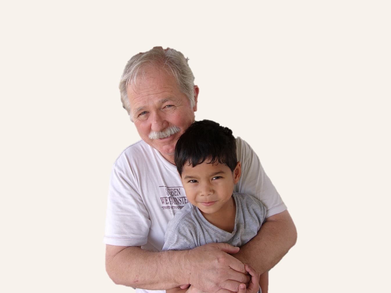 Randy hugging a young boy