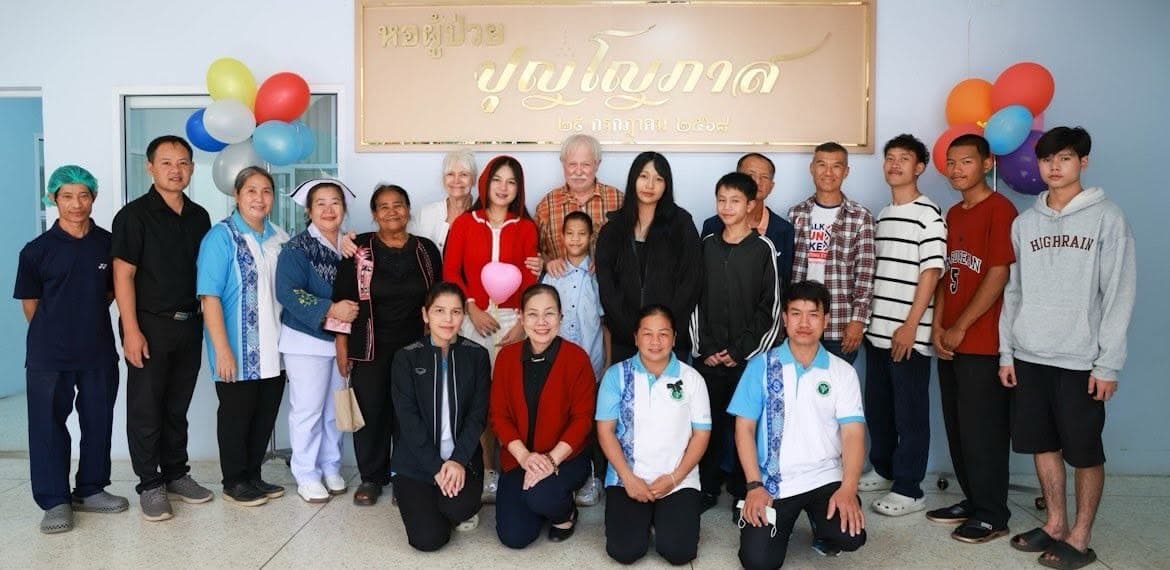 Staff and grown kids with Randy and Kathleen